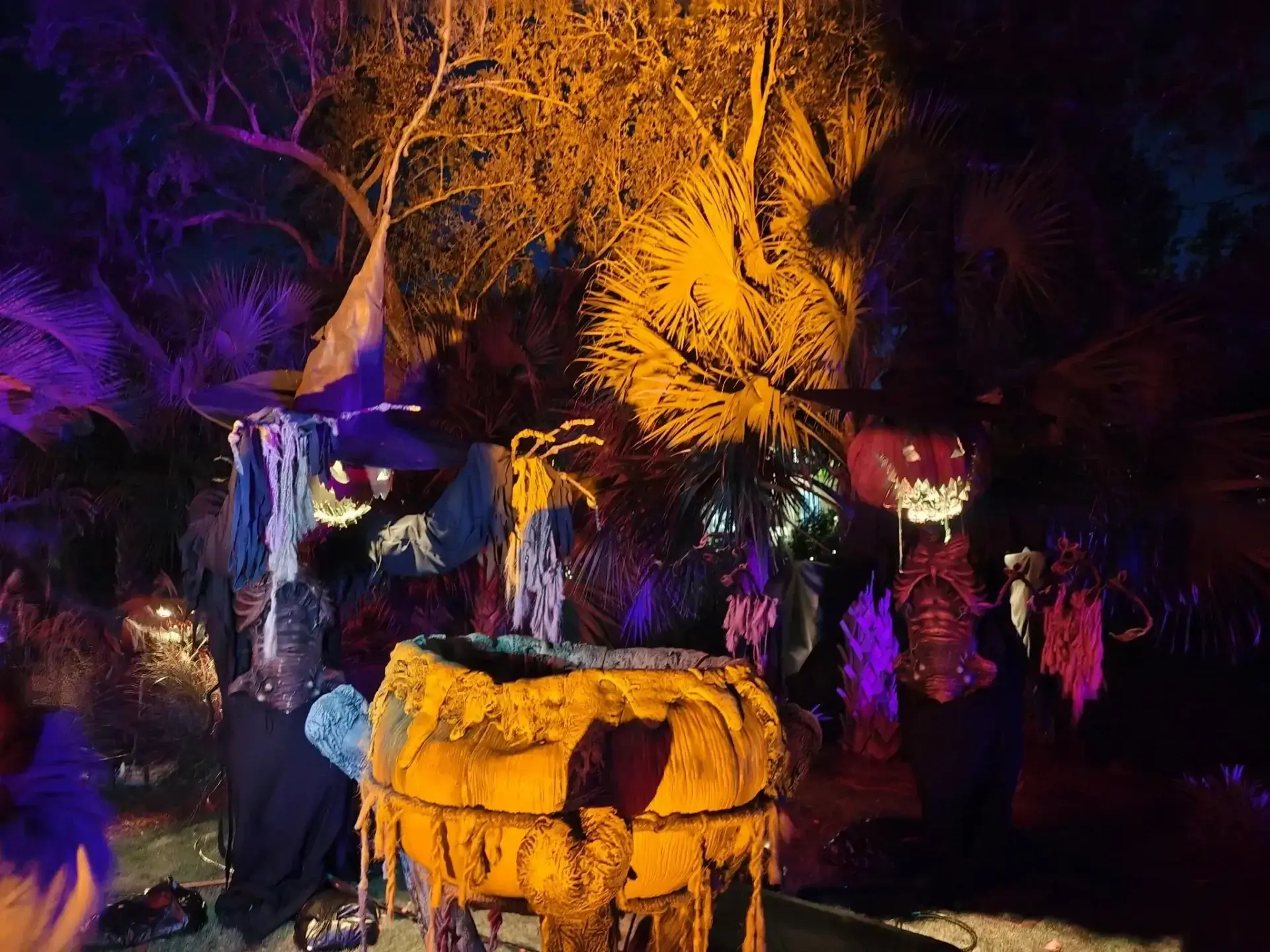 Colorful Halloween decorations with spooky figures.