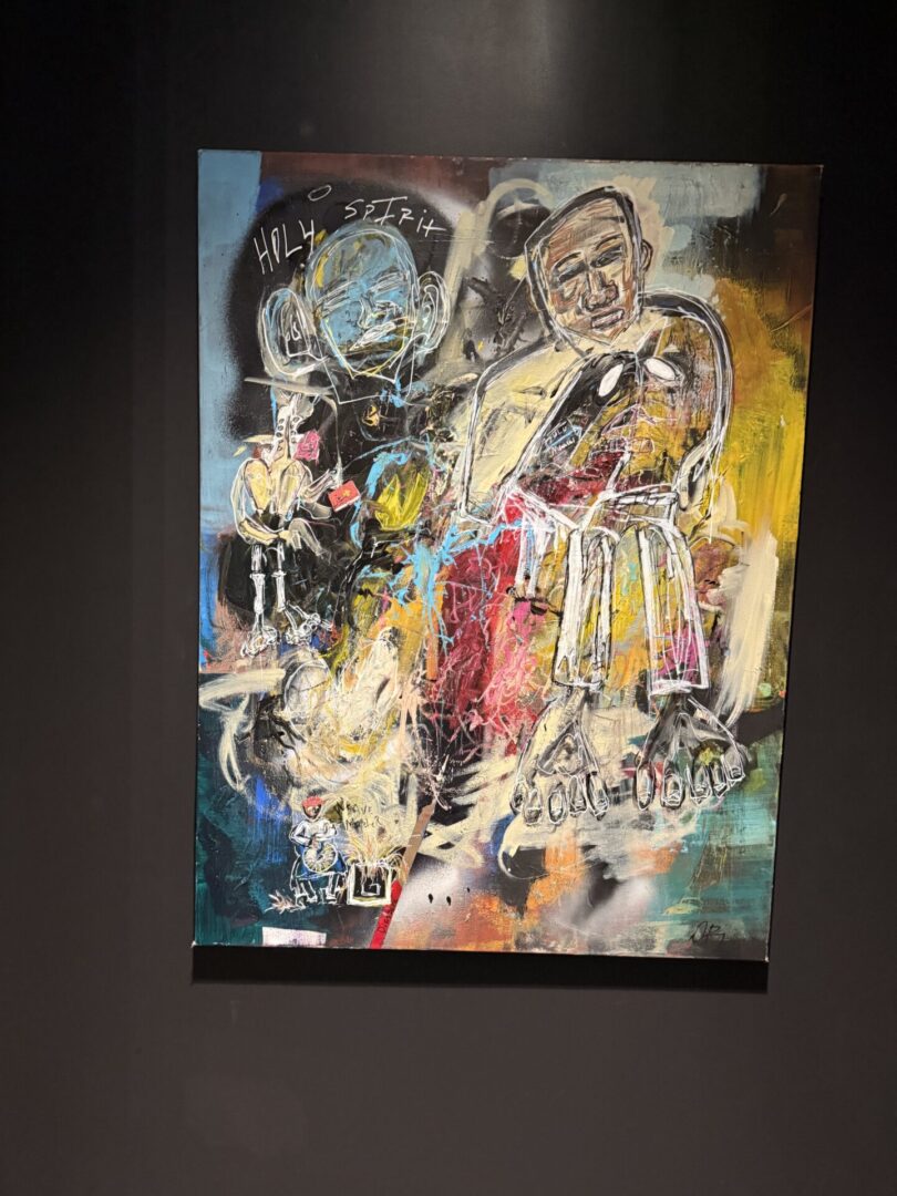 Abstract painting with vibrant colors and figures.