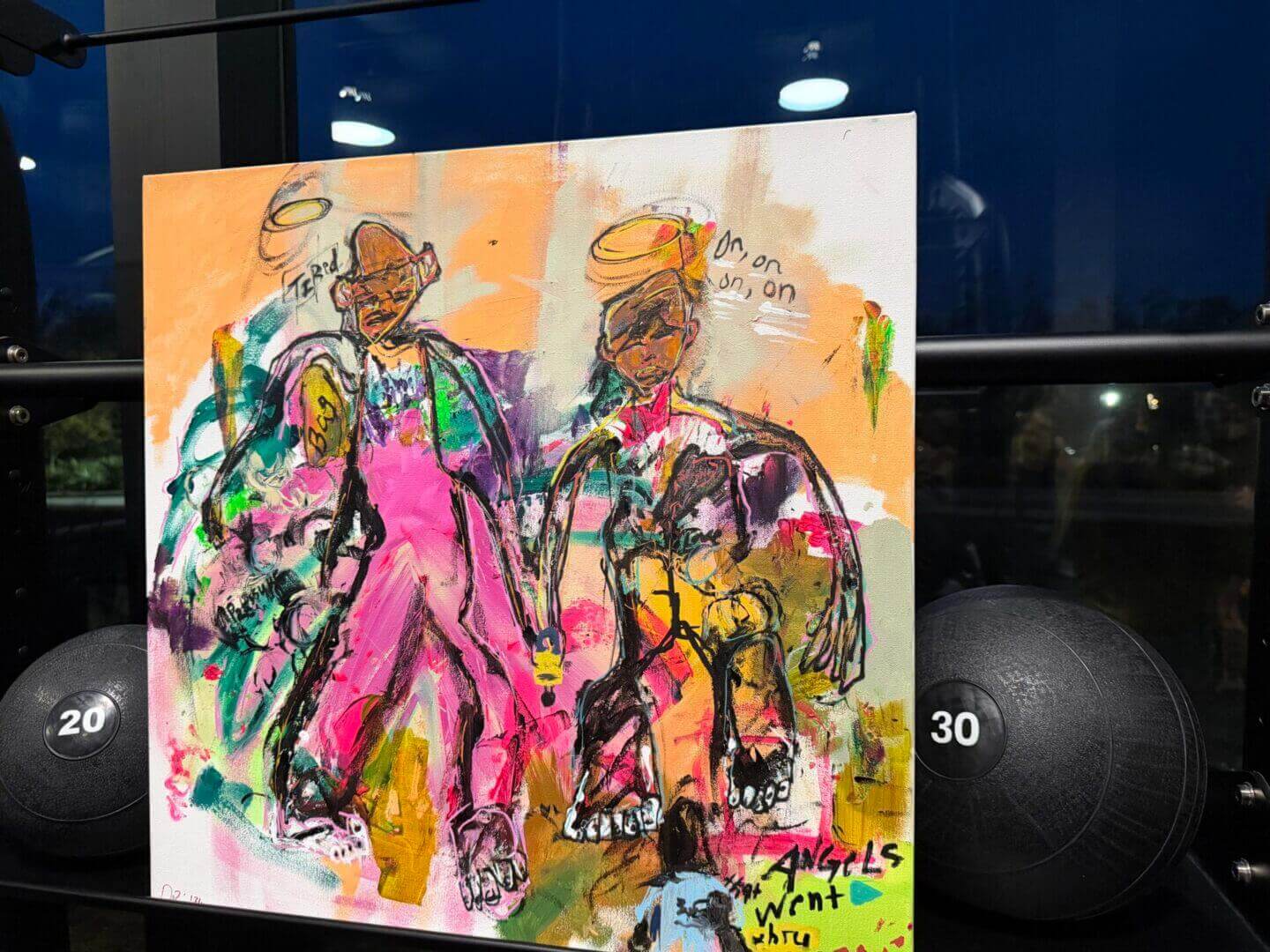 Colorful abstract painting of two figures.