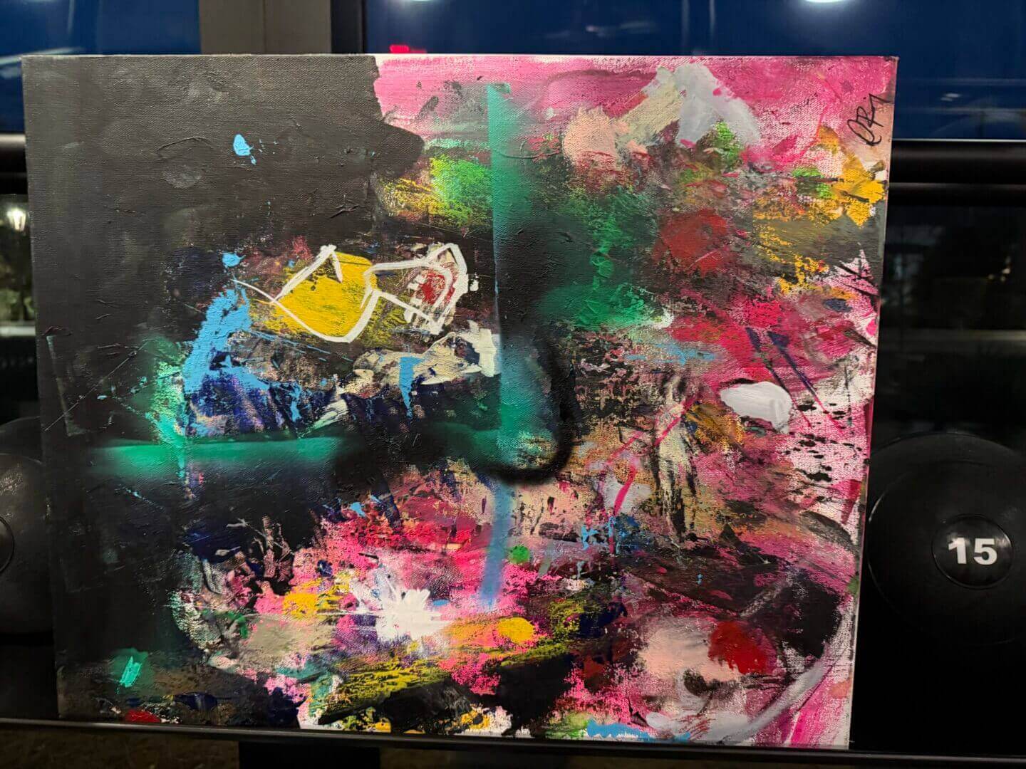 Abstract painting with vibrant, colorful brushstrokes.