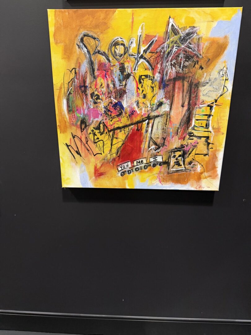 Abstract painting with vibrant colors and text.